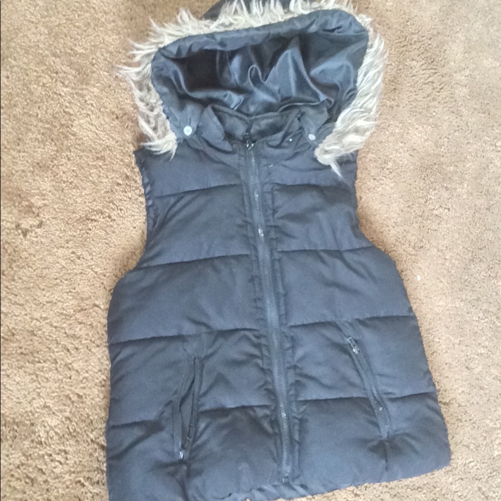 Button down vests that also zips too!